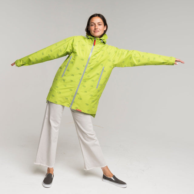 Person wearing a neon lime green rain jacket