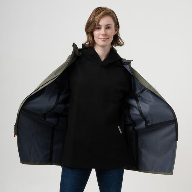 women with black hoody and trench coat