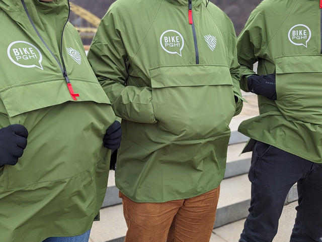 Trio of Green BikePGH Anoraks