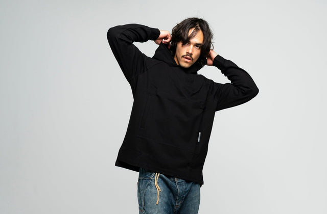 man wearing a black hoody 